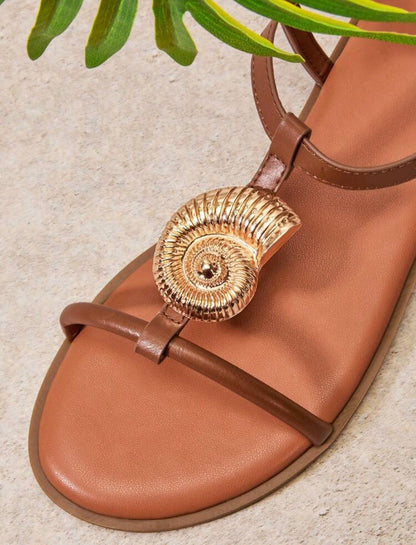 SANDALIAS DE CONCHA